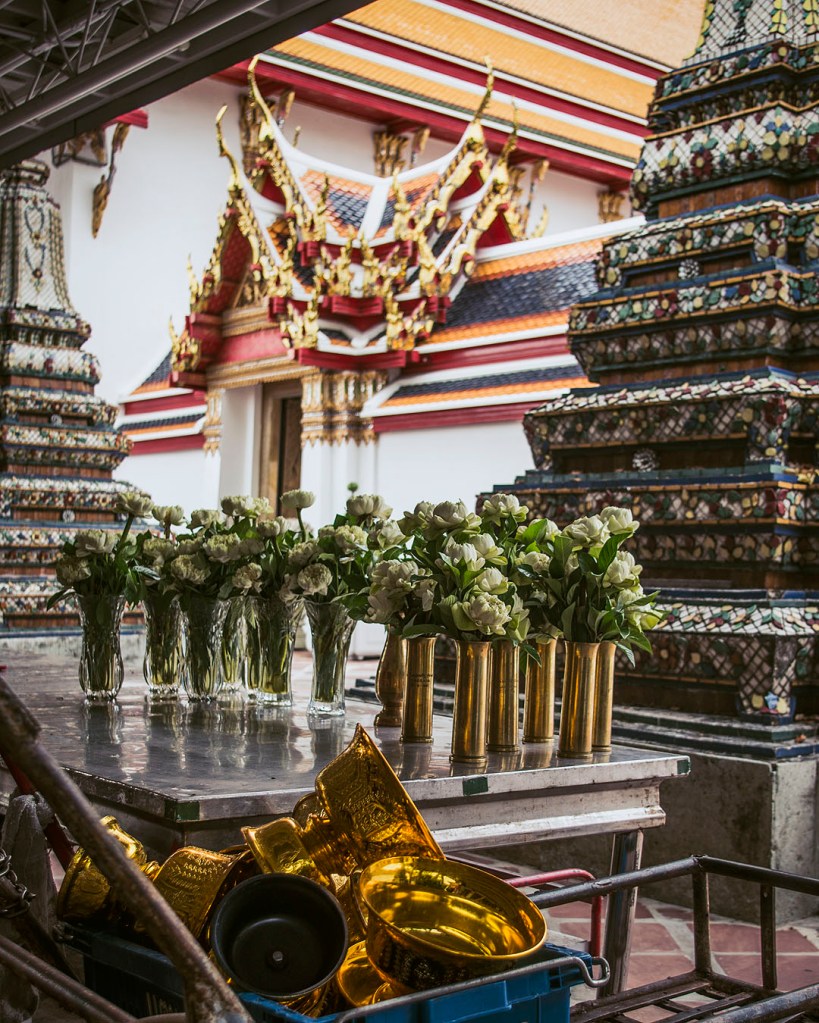 Flowers on a table in the Wat Pho temple complex