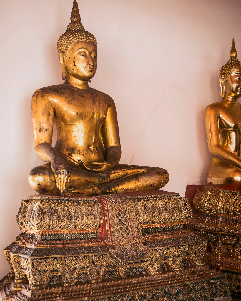 A golden Buddha statue at Wat Pho in Bangkok