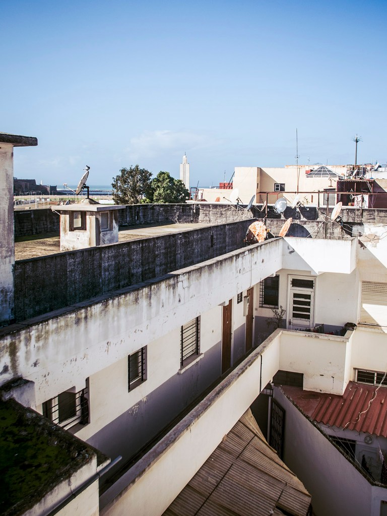 A minaret over rooftops in Salé, Morocco.