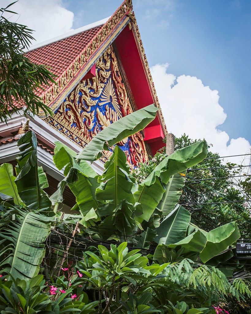 The roof of a temple and tree in Bangkok.