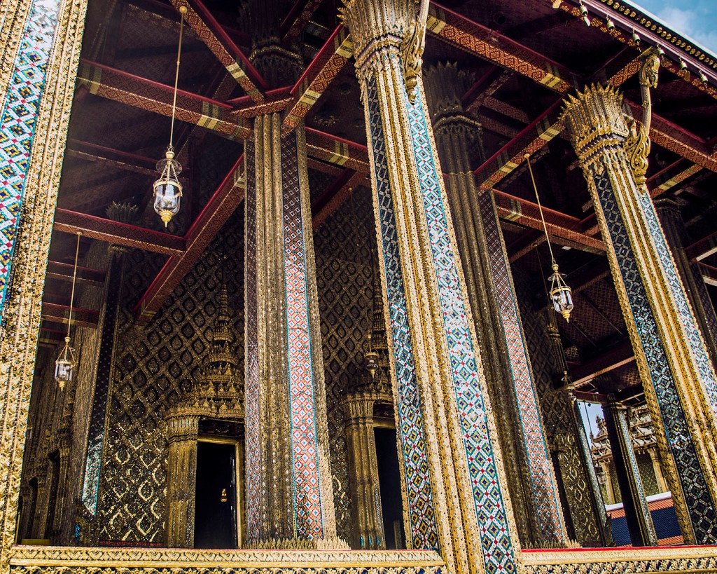 Mosaics on gilded columns of the Phra Ubosot, Chapel of the Emerald Buddha, in the Grand Palace.
