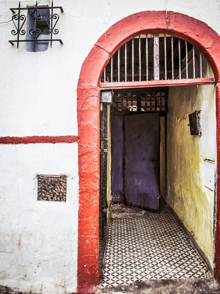 A red doorway to a house in Salé, Morocco.