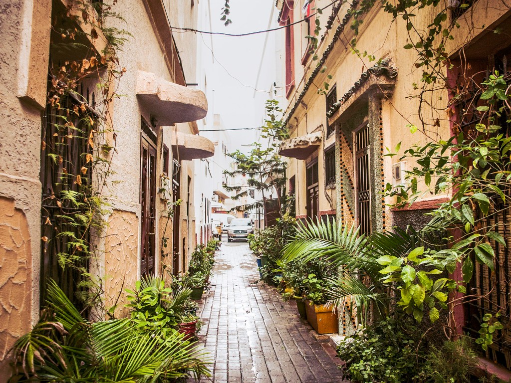 Yellow buildings in an alleyway in Salé, Morocco.