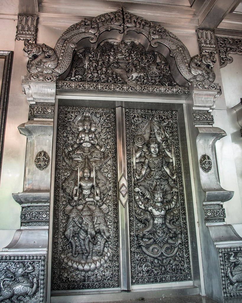 The doors of the silver Suttajitto Gallery at Wat Muen San.