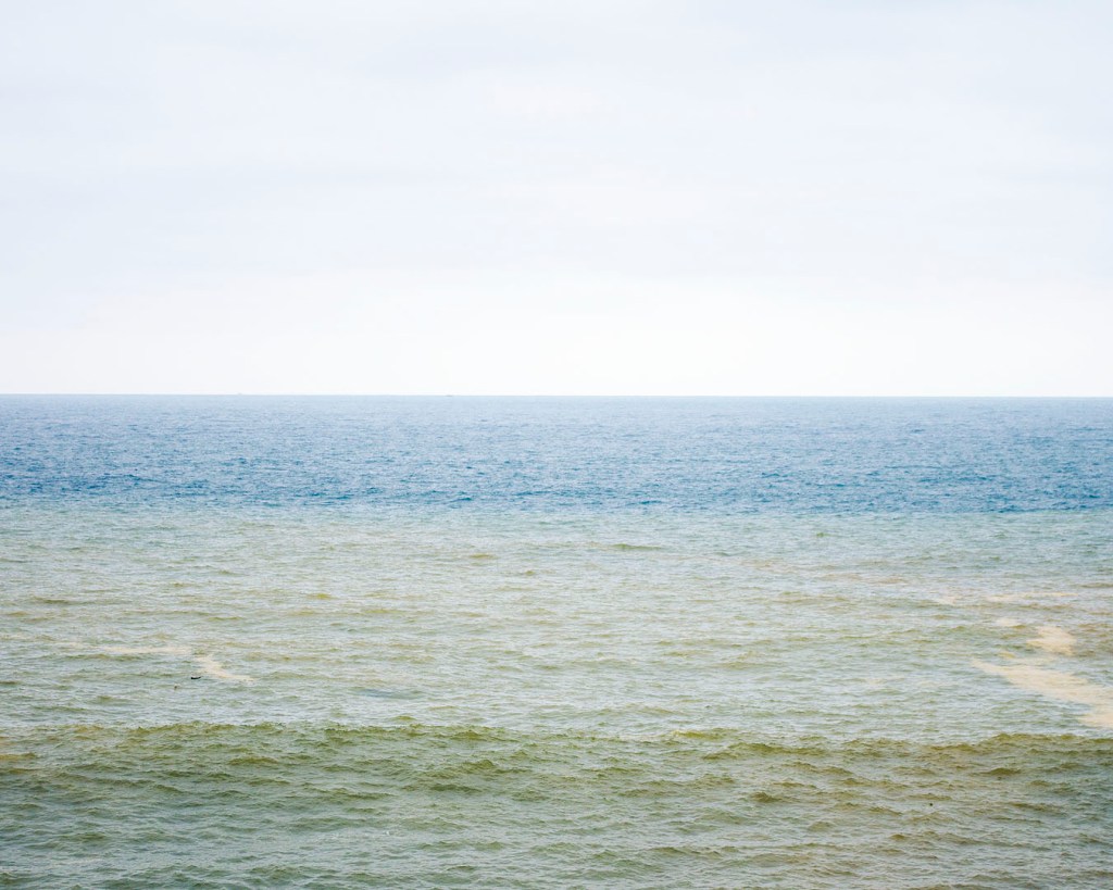 The gold and blue water of the Yin-Yang Sea near Jiufen, Taiwan.
