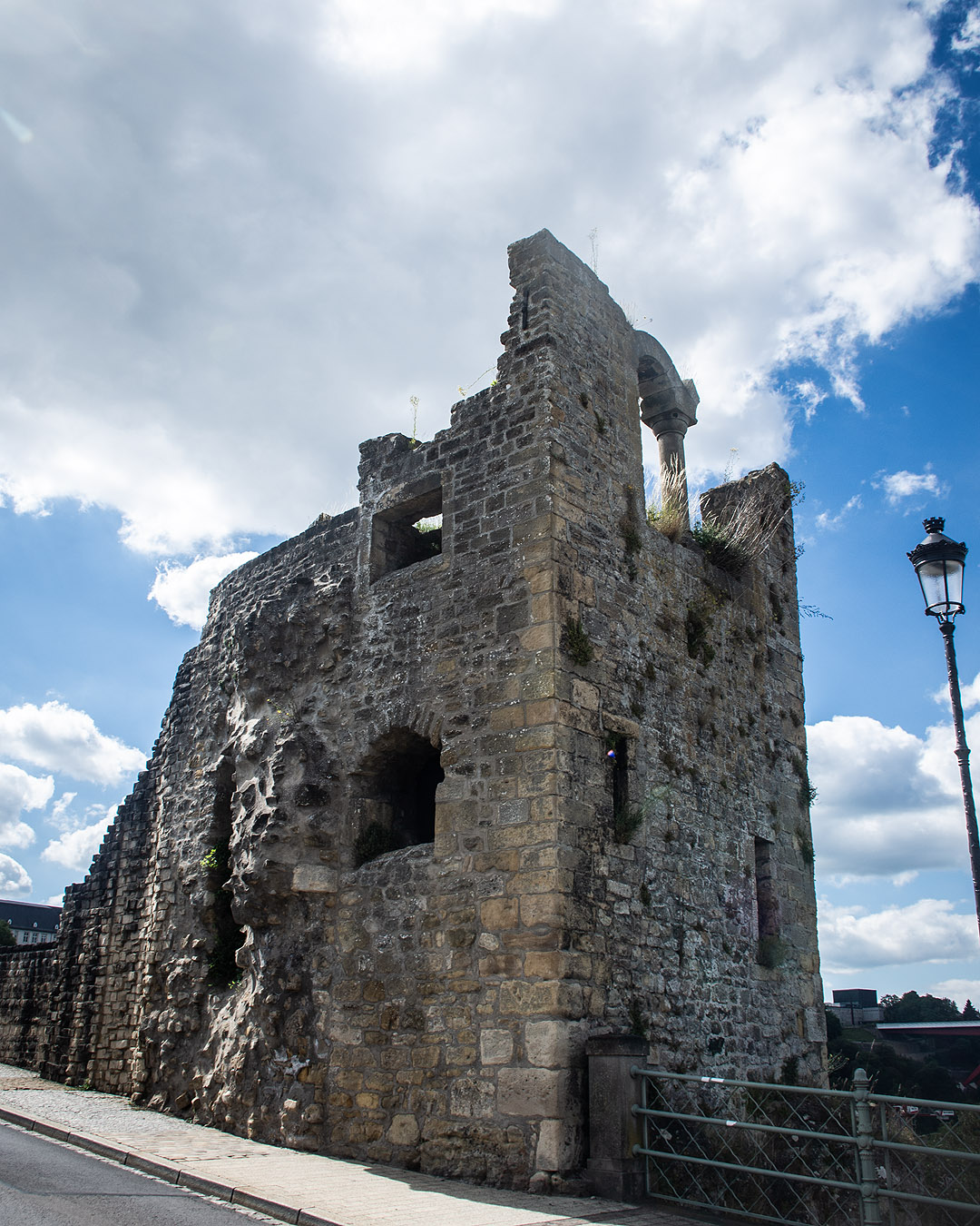 The crumbling Dent Creuse ruin under a blue sky.