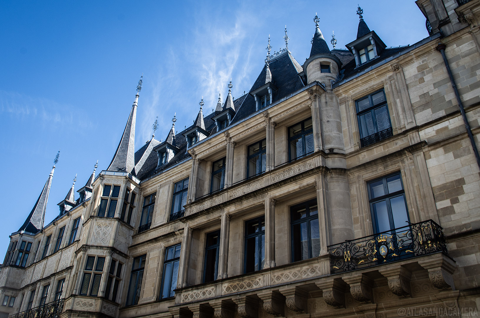 The exterior of the Palais Grand-Ducal on a sunny day in Luxembourg.